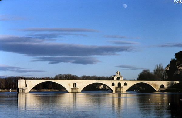 St Bénezet bridge (12thC) with moon above. Avignon, France.