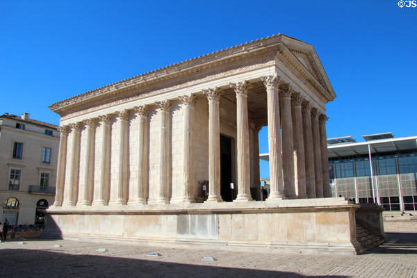 Maison Carrée Roman temple (c2 CE) sits on ancient Roman forum square. Nimes, France.