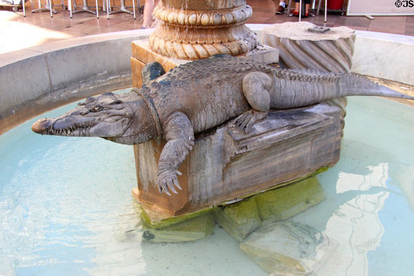 Crocodile carved in fountain. Nimes, France.