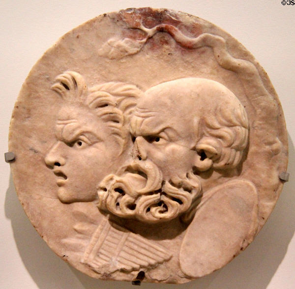 Roman marble (oscillum) with masks of Silenus & Satyr (1st-2ndC) at Musée de la Romanité. Nimes, France.