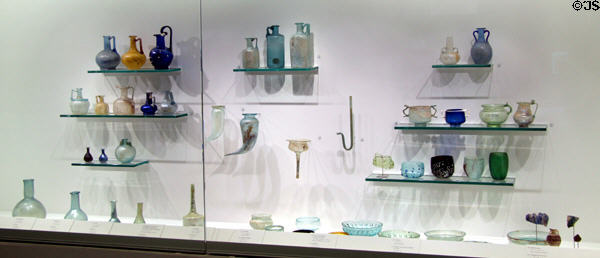 Collection of Roman glass objects from daily life (c1st-2ndC) at Musée de la Romanité. Nimes, France.
