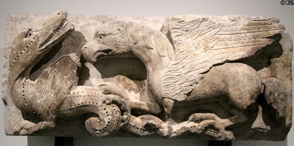 Combat of griffin & monster stone carving (2nd half 12thC) at Musée de la Romanité. Nimes, France.