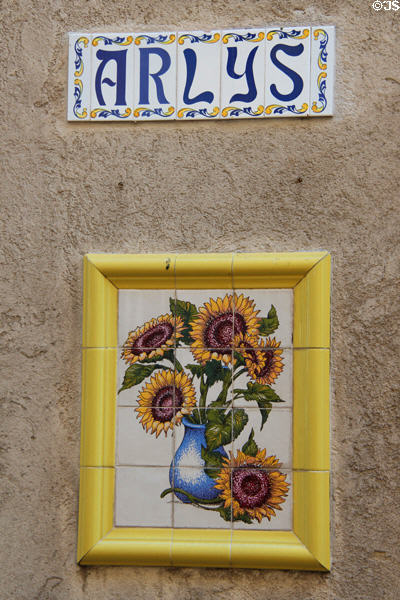 Tile wall decoration with sunflowers. Arles, France.