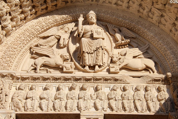 Christ with Evangelist symbols (angel of St Luke, eagle of St John lion of St Matthew, bull of St Mark) over Apostles on Last Judgment scene over portal of St Trophime church. Arles, France.