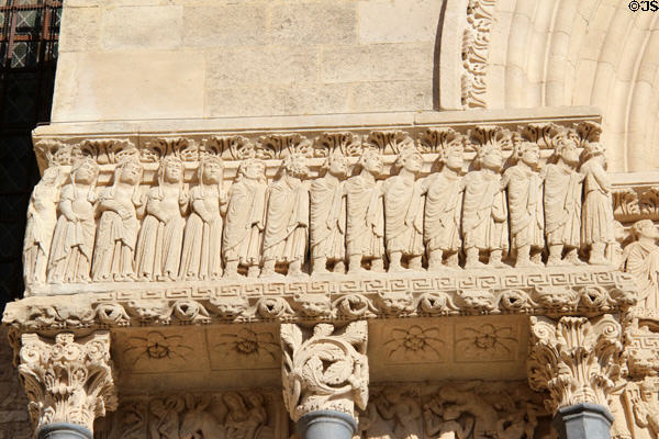 Row of saved souls going to heaven in Last Judgment scene carved to left of portal of St Trophime church. Arles, France.