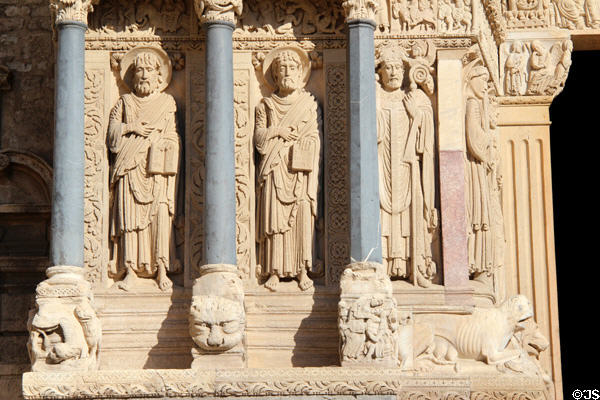 St Bartholomew, St James the Great, St Trophimus sculpted to left of portal of St Trophime church. Arles, France.