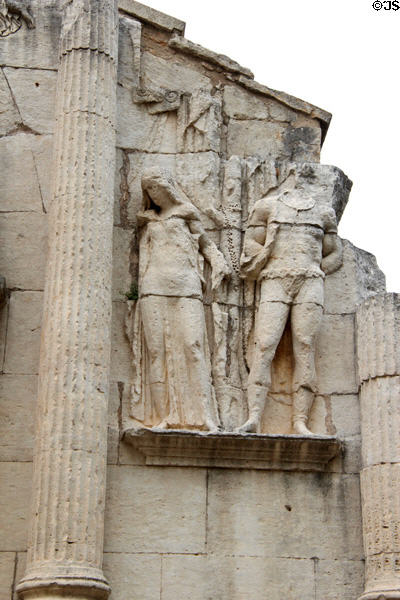 Relief of woman & man flanking tree trunk on Arch (c20 BCE) at Glanum Roman Ruins. Saint-Rémy-de-Provence, France.