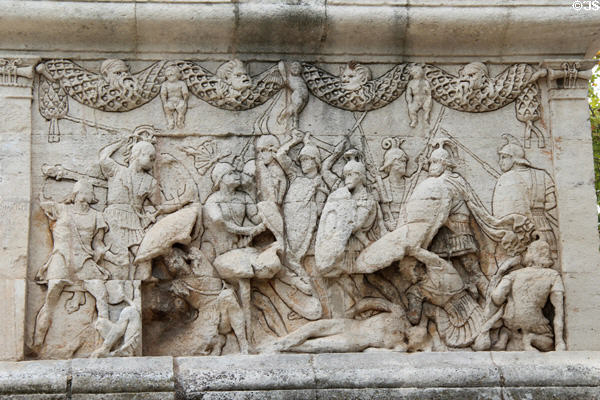 Homeric style soldier protecting body of fallen comrade on battle relief (30-20 BCE) on west base of Roman Mausoleum at Glanum Ruins. Saint-Rémy-de-Provence, France.