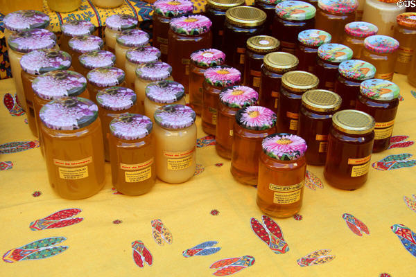 Jars of honey at vegetable market. Aix-en-Provence, France.