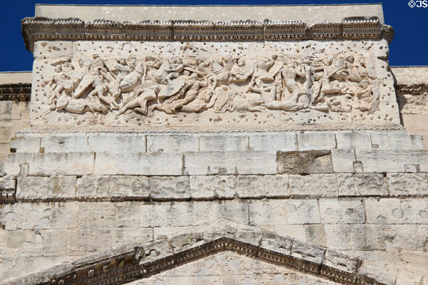 Relief of mounted Romans defeating enemies atop triumphal arch of Orange (10-25 CE). Orange, France.