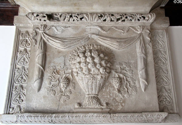 Carved stone relief of basket of flowers at Orange museum of art & history. Orange, France.