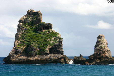 Rocks rise from sea at Pointe des Châteaux. Guadeloupe.