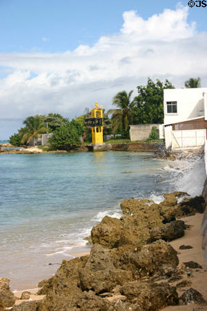 Port marker along shoreline. Port Louis, Guadeloupe.