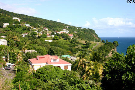 Houses along coast near Vieux Fort. Guadeloupe.