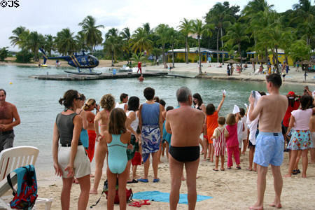 Bathers watching Père Noël land. Guadeloupe.