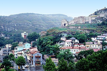 Narikala Fortress, colorful houses & surrounding hills of Tbilisi. Georgia.