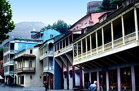 Balconies overhang old quarter streets in Tbilisi. Georgia.