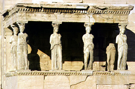 Female statues serve as columns on Porch of the Caryatids on the Acropolis, Athens. Greece.