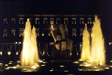 Lit fountains at night in front of City Hall, Athens. Greece.