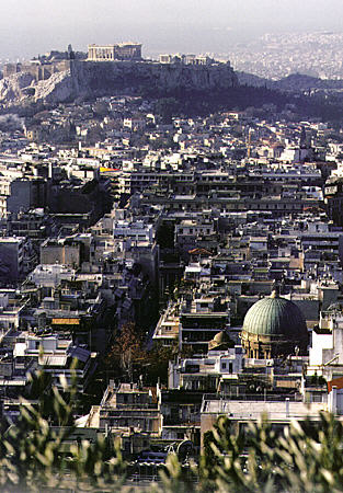 View of Athens from Likavitos hill top with Acropolis and Parthenon in distance. Greece.