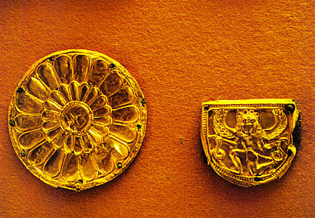 Greek mythological stories in gold leaf on bronze from Delphi Museum. Greece.