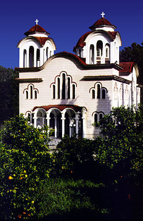 Modern church and orange trees on Pelopennesian Peninsula. Greece.