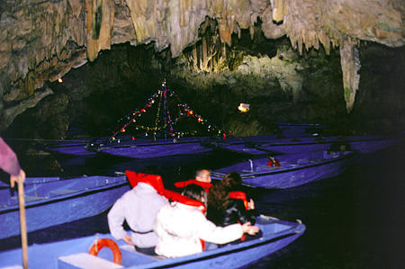 Dyros caves are toured by boat. Greece.