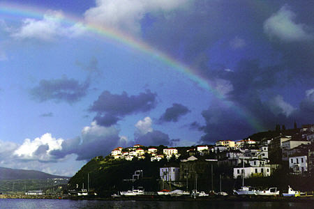 Rainbow over town of Pilos. Greece.