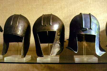 Illyrian style bronze helmets in Olympia Museum. Greece.