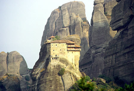 One of the monasteries of Meteora sits high on the rocky cliffs. Greece.