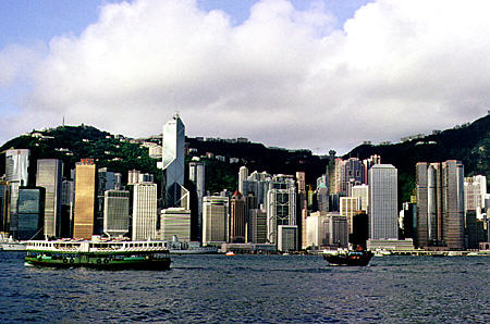 Skyline of Hong Kong with ferry seen from Kowloon. Hong Kong.