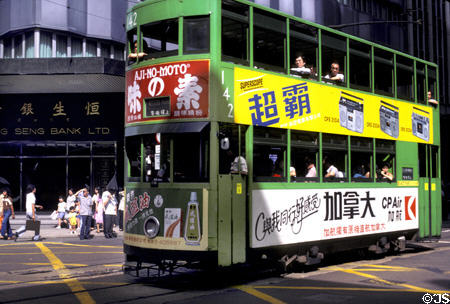 Heritage double deck tram rolls on street of Honk Kong. Hong Kong.