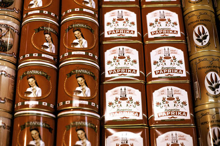 Colorful cans of paprika in Budapest's Central Market. Hungary.