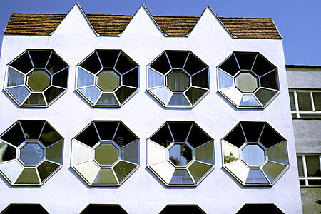 Modern building with hexagonal windows in Kecskemét. Hungary.
