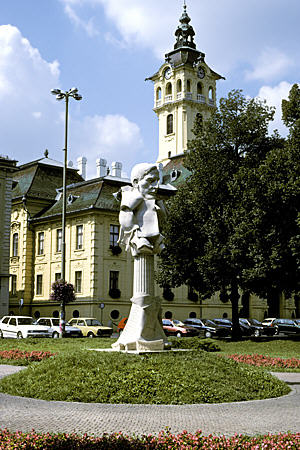 City Hall tower & modern statue in Széchenyi Square, Szeged. Hungary.