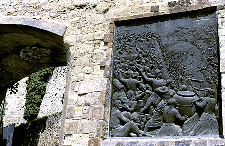 Relief (1952) on southern gate of Var Castle in Eger by Istvan Tar & Gyula Illés depicts heroic defense of castle in 1552. Hungary.