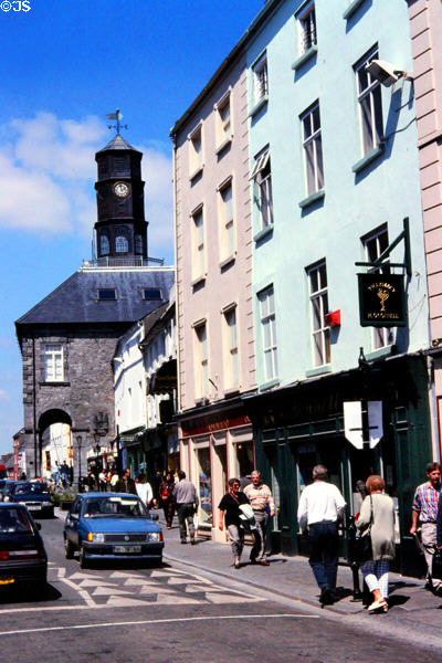 Kilkenny streetscape with city hall under octagonal clock tower, a former arcaded toll house (1761). Ireland.