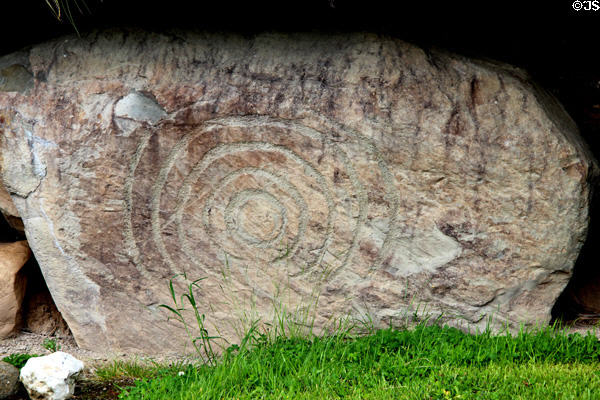 Neolithic carved stone with concentric circle design at Knowth. Ireland.