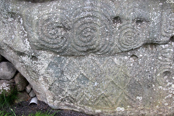 Megalithic carving of spirals & crosshatches at Newgrange. Ireland.