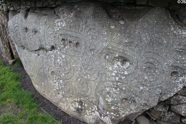 Megalithic carving of spirals & pits at Newgrange. Ireland.