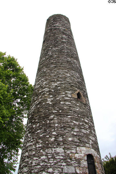 Round tower (10th-11thC) built as protection against Viking raiders at Monasterboice. Ireland.