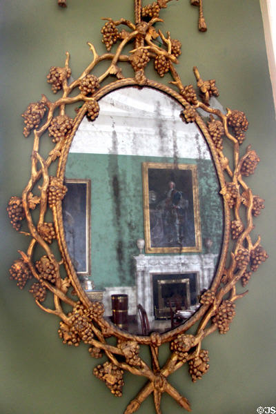 Giltwood pier glass mirror with carved symbols of Bacchus by Richard Cranfield of Dublin at Castletown House. Ireland.