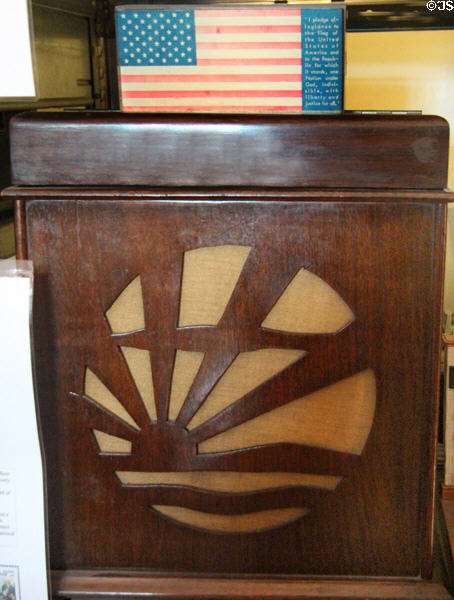 American radios with flag atop one with rising sun, ordered off market during WWII at Hurdy Gurdy Museum of Vintage Radio. Howth, Ireland.