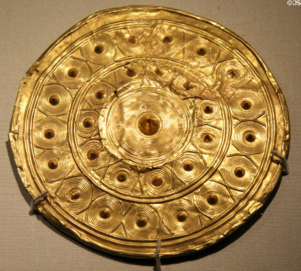 Gold disk from ear-spool (c800-700 BCE) from Enniscorthy at National Museum of Ireland Archaeology. Dublin, Ireland.