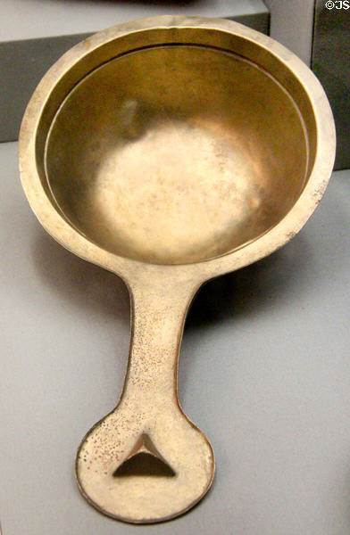 Copper alloy wine ladle (8th-9thC) at National Museum of Ireland Archaeology. Dublin, Ireland.