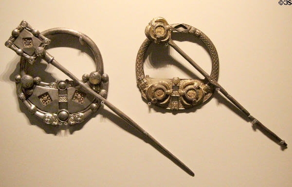 Silver Irish annular brooches - (9thC) from Kilkenny & (late 8th-early 9thC) from Cavan at National Museum of Ireland Archaeology. Dublin, Ireland.