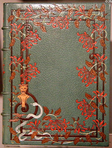 Decorated leather book binding with Satyr & snake from France at Chester Beatty Library. Dublin, Ireland.