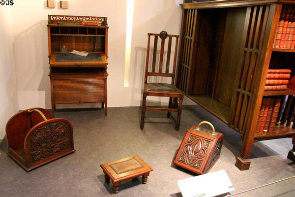 Lady's writing cabinet (c1890) by Arthur Jones; dining chair (c1900) by Millar & Beatty of Dublin; & log carrier + coal scuttle (c1890s) by Anne Bourke of Limerick at National Museum Decorative Arts & History. Dublin, Ireland.