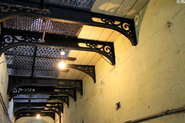 Iron brackets & floor between range levels at Kilmainham Gaol. Dublin, Ireland.
