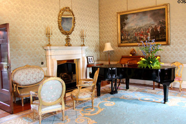 Fireplace & piano in state drawing room at Aras an Uachtarain. Dublin, Ireland.